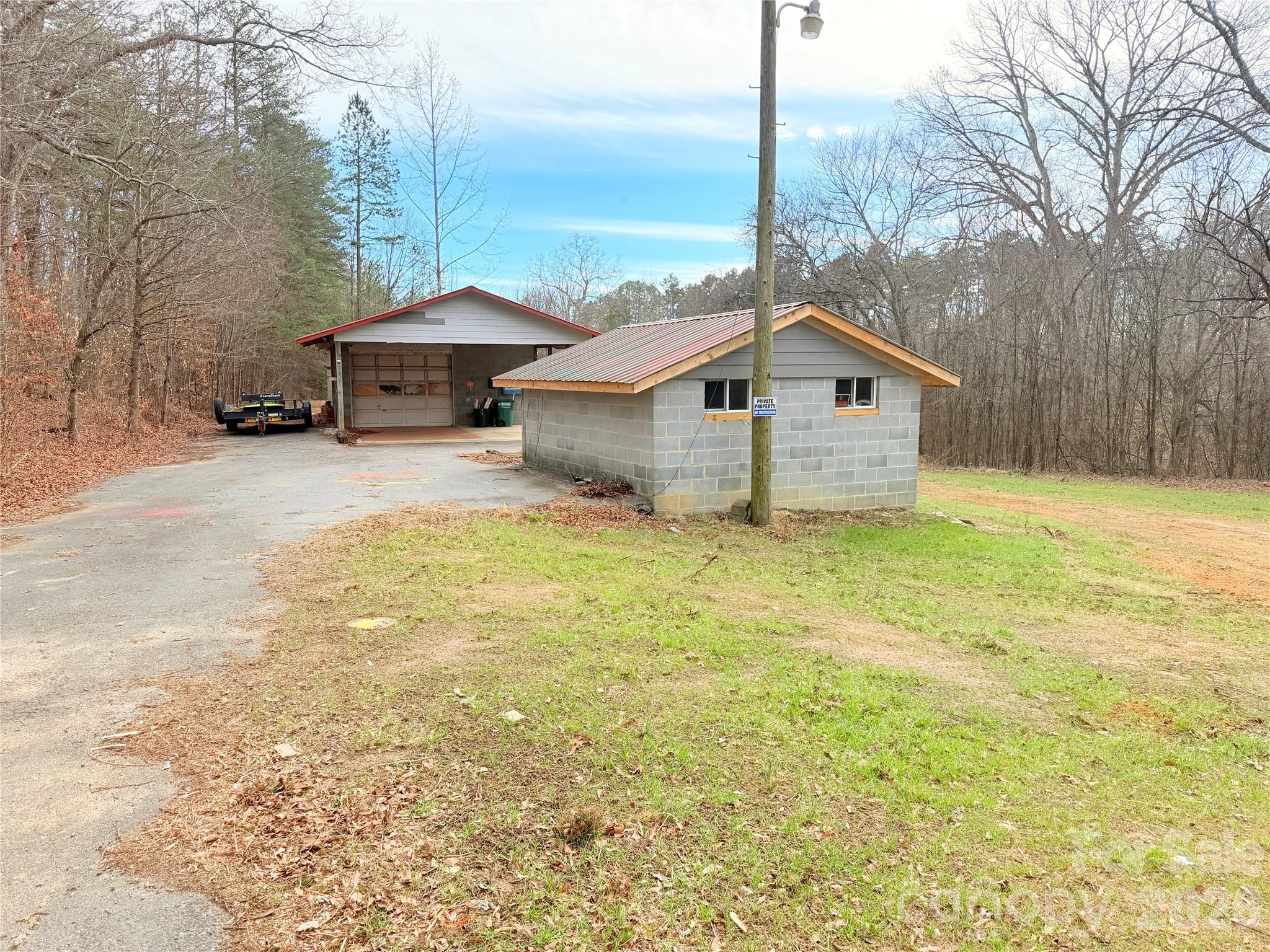 1266 Old Lincolnton Crouse Road Crouse, NC 28033 - Photo 11 of 34 a front view of a house with a yard