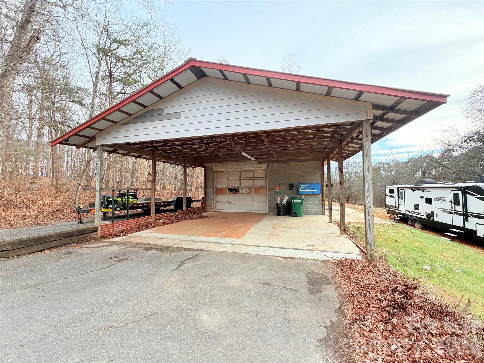 1266 Old Lincolnton Crouse Road Crouse, NC 28033 - Photo 17 of 34 a view of a house with a patio and a yard