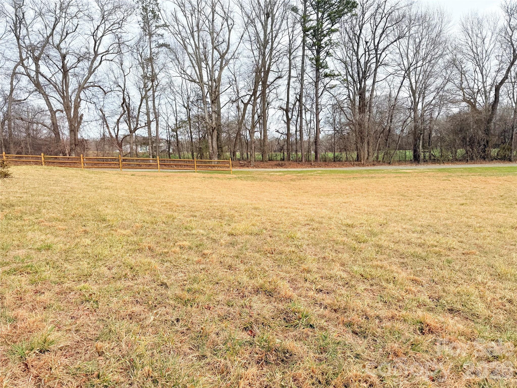 1266 Old Lincolnton Crouse Road Crouse, NC 28033 - Photo 3 of 34 a view of outdoor space with swimming pool and trees