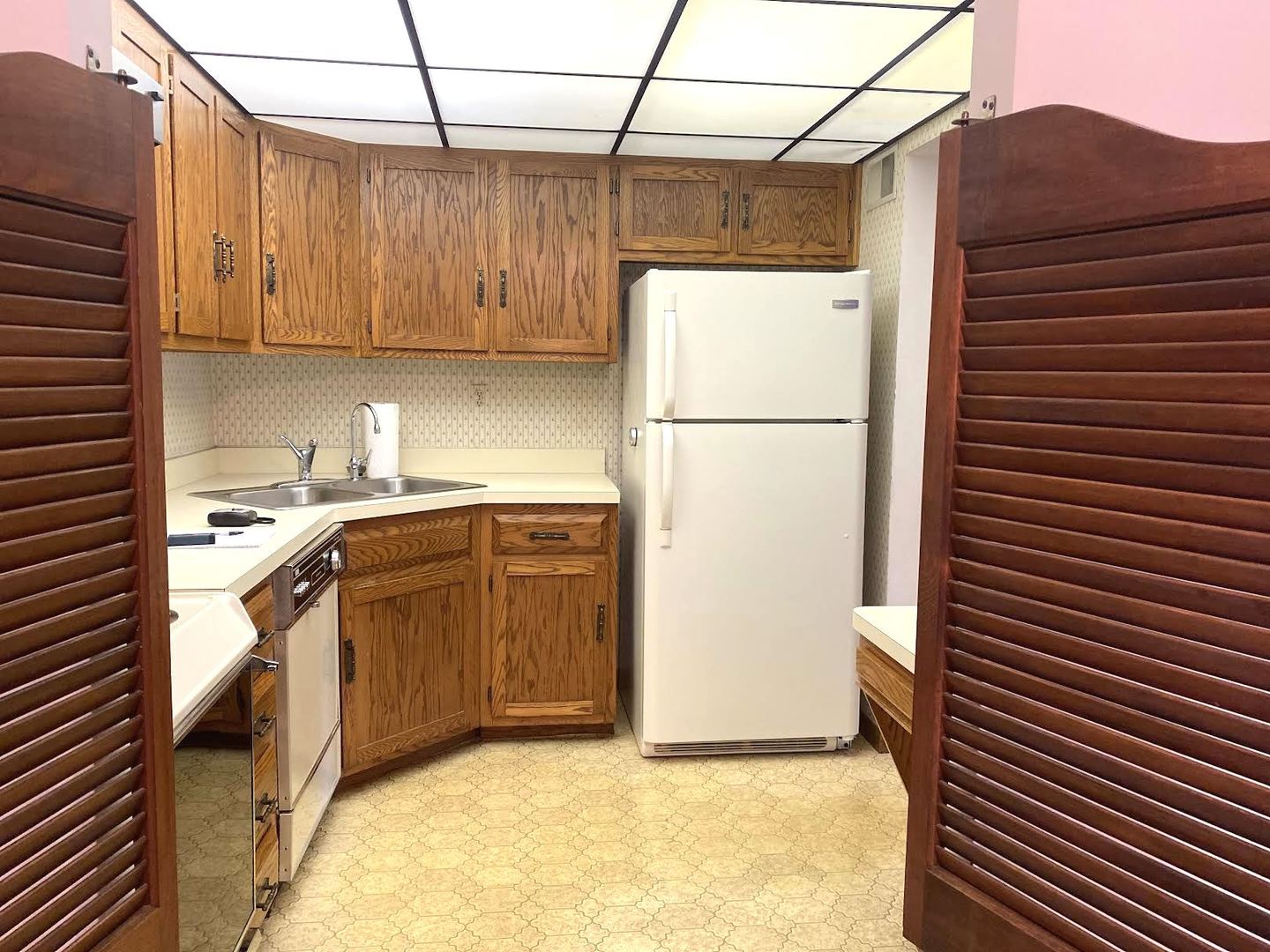 1503 Woodbridge Road, Unit 1C Joliet, IL 60436 - Photo 2 of 8 a utility room with dryer and washer