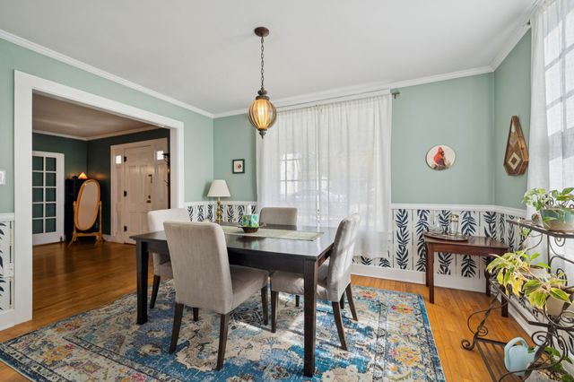 a view of a dining room with furniture