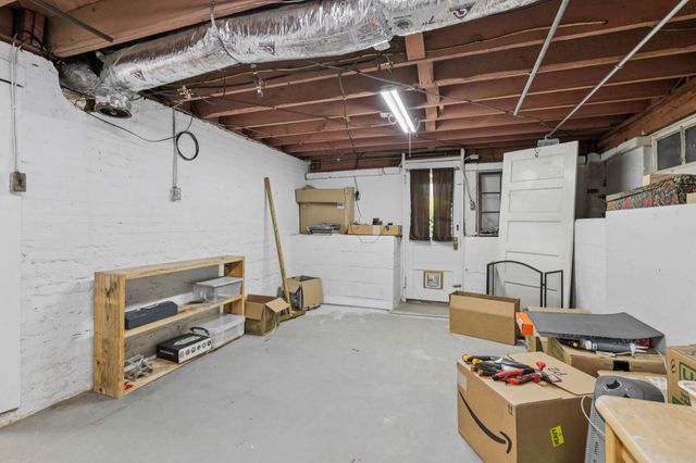 a room with storage and utility