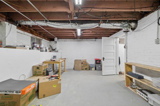 a view of storage and utility room with racks