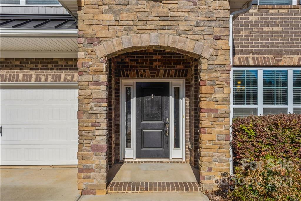 108 Kentmere Lane Clover, SC 29710 - Photo 2 of 36 a front view of a house with a door