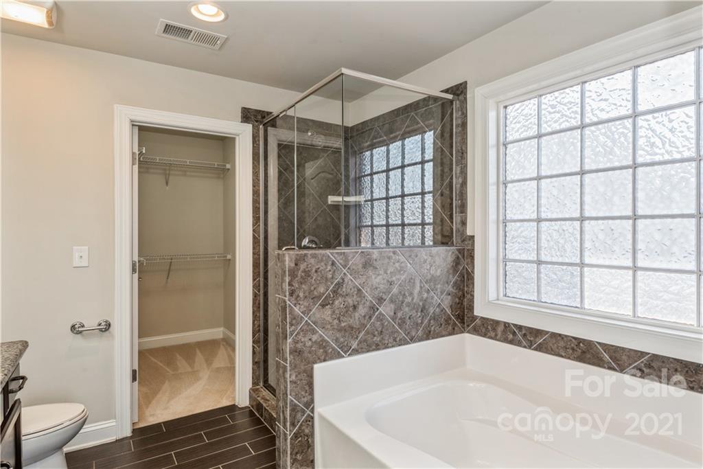 108 Kentmere Lane Clover, SC 29710 - Photo 27 of 36 a bathroom with a bathtub and a toilet
