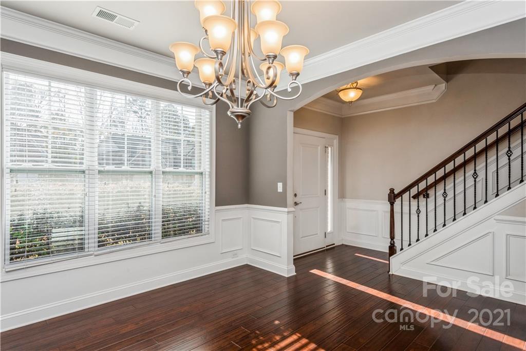 108 Kentmere Lane Clover, SC 29710 - Photo 5 of 36 a view of an empty room with wooden floor and a window