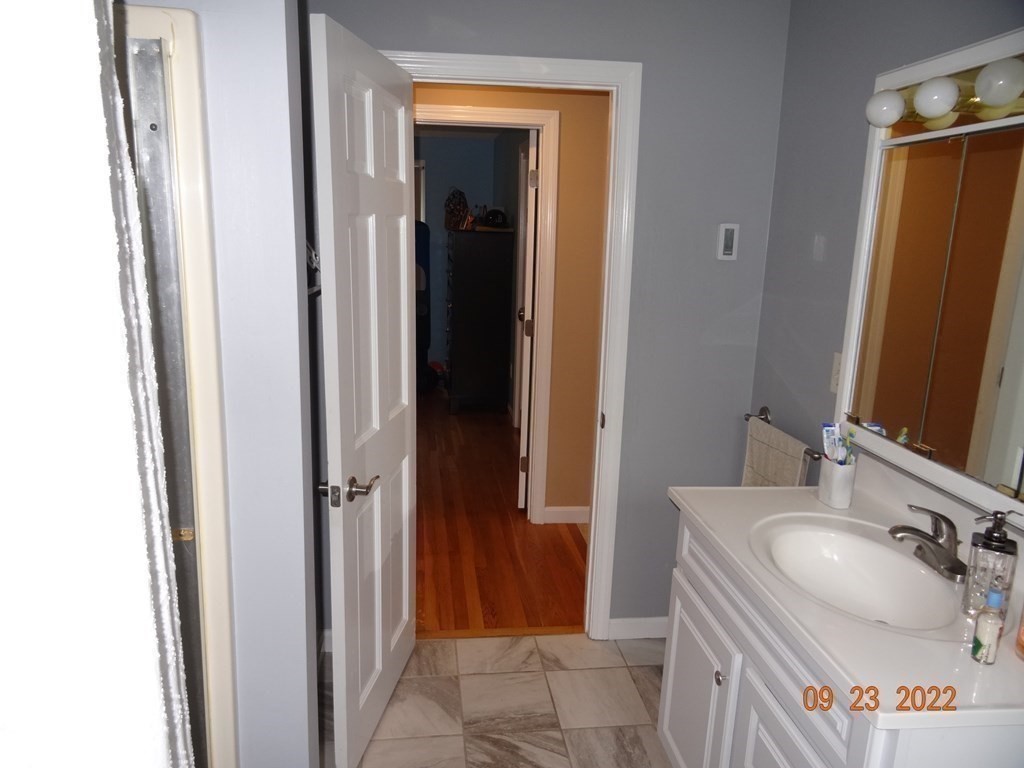 41 Hazen Road Shirley, MA 01464 - Photo 13 of 40 a bathroom with a sink and a mirror