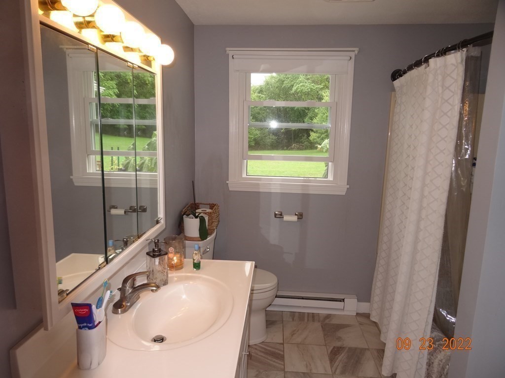 41 Hazen Road Shirley, MA 01464 - Photo 14 of 40 a bathroom with a sink toilet and tub