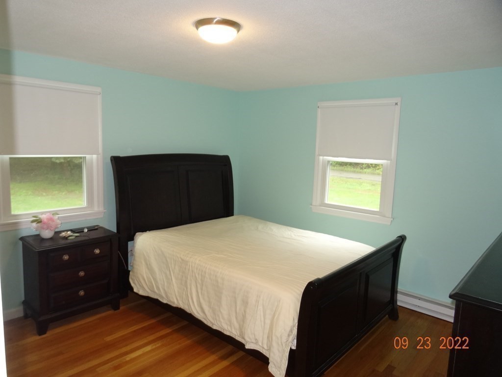 41 Hazen Road Shirley, MA 01464 - Photo 15 of 40 a bedroom with a bed and a dresser