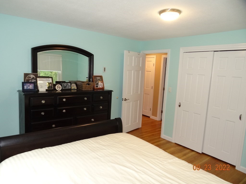 41 Hazen Road Shirley, MA 01464 - Photo 17 of 40 a bedroom with a bed and a dresser