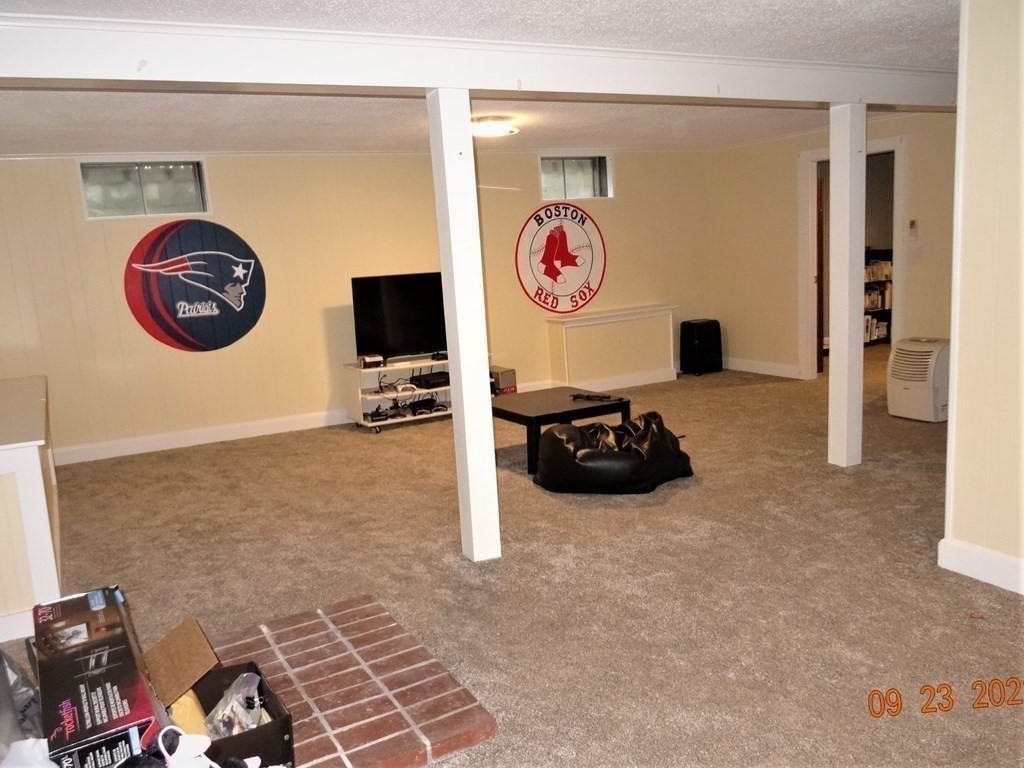 41 Hazen Road Shirley, MA 01464 - Photo 24 of 40 a view of a storage & utility room with a fan