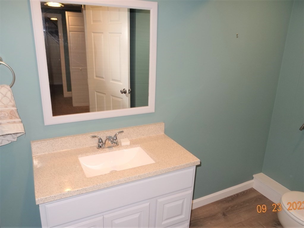 41 Hazen Road Shirley, MA 01464 - Photo 30 of 40 a bathroom with a sink and a mirror