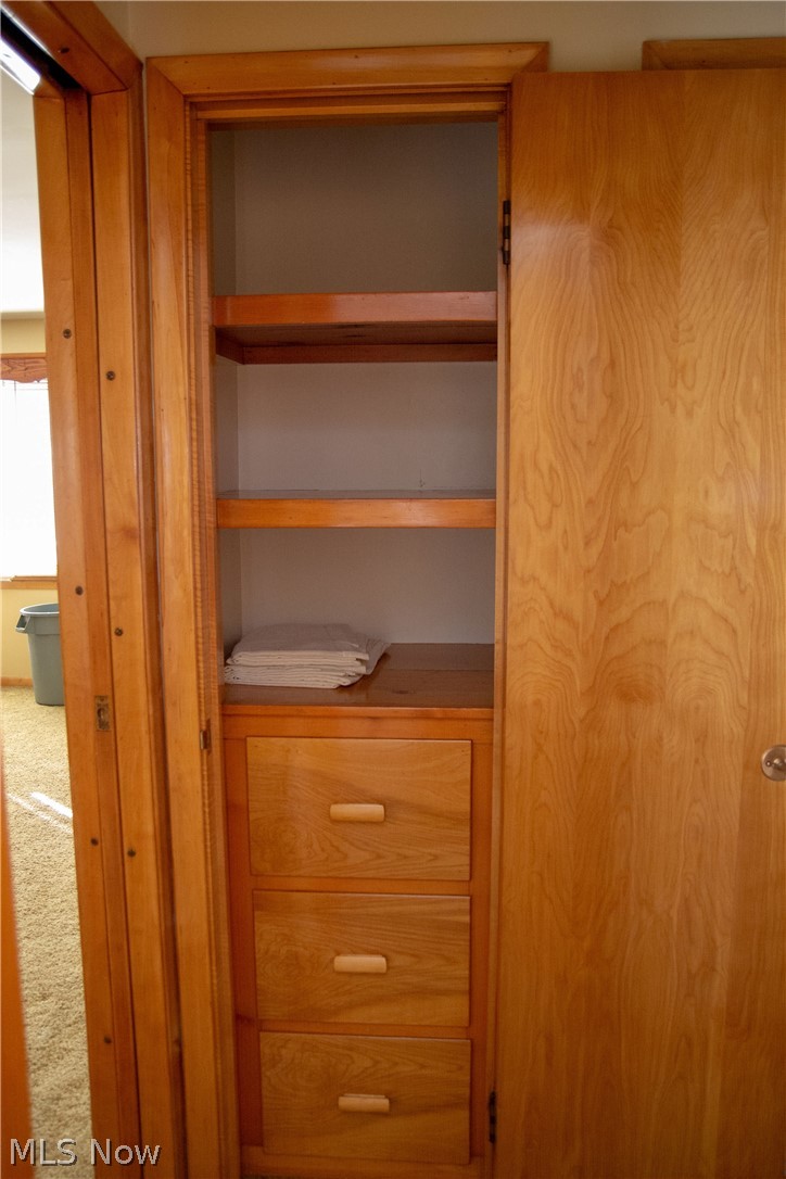 926 Ridge Road Northwest Canton, OH 44703 - Photo 18 of 35 Deep linen closet in hallway across from bath.