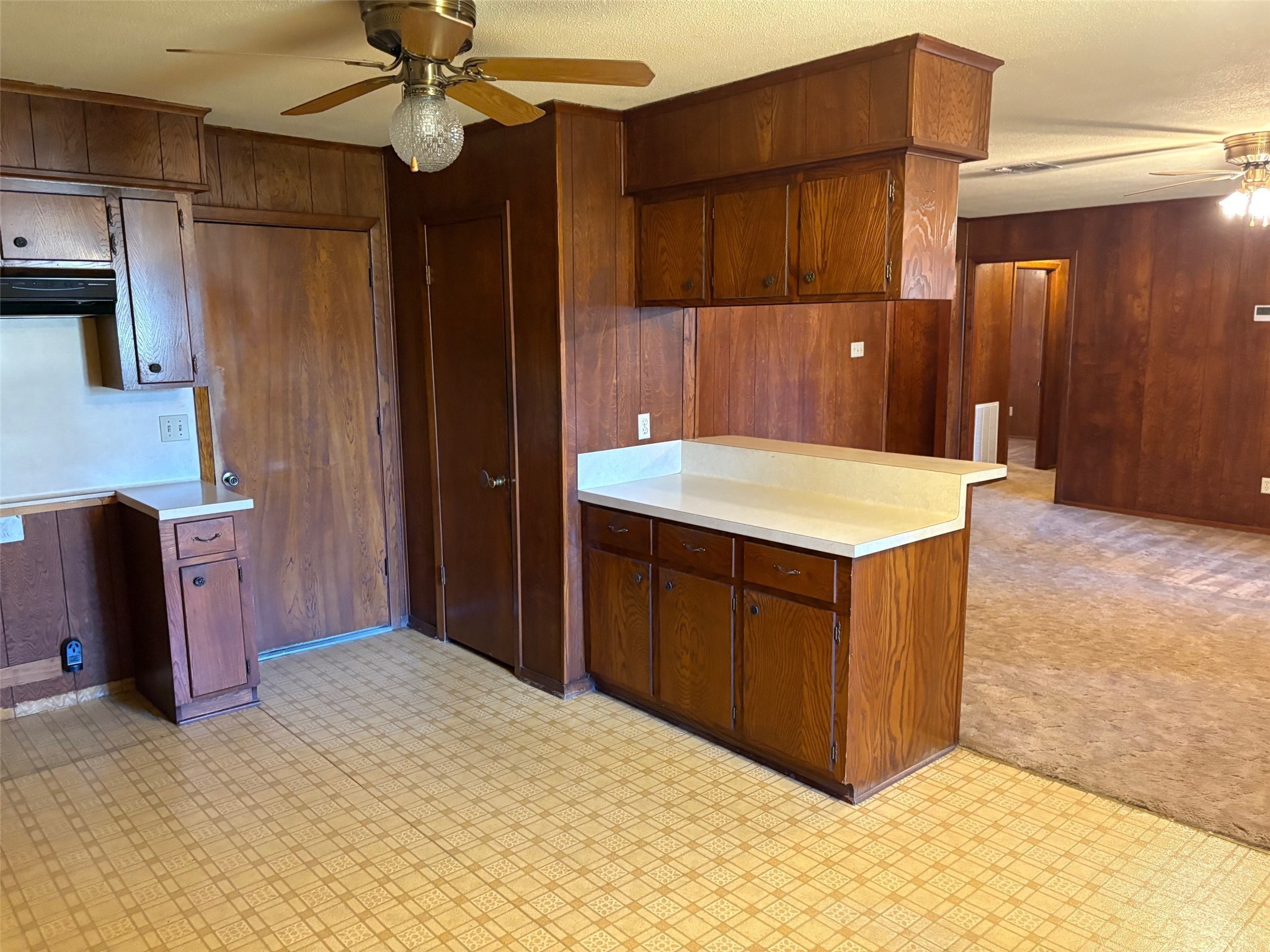 2126 Ripple Creek Drive Rosenberg, TX 77471 - Photo 13 of 21 a kitchen with a refrigerator and a sink