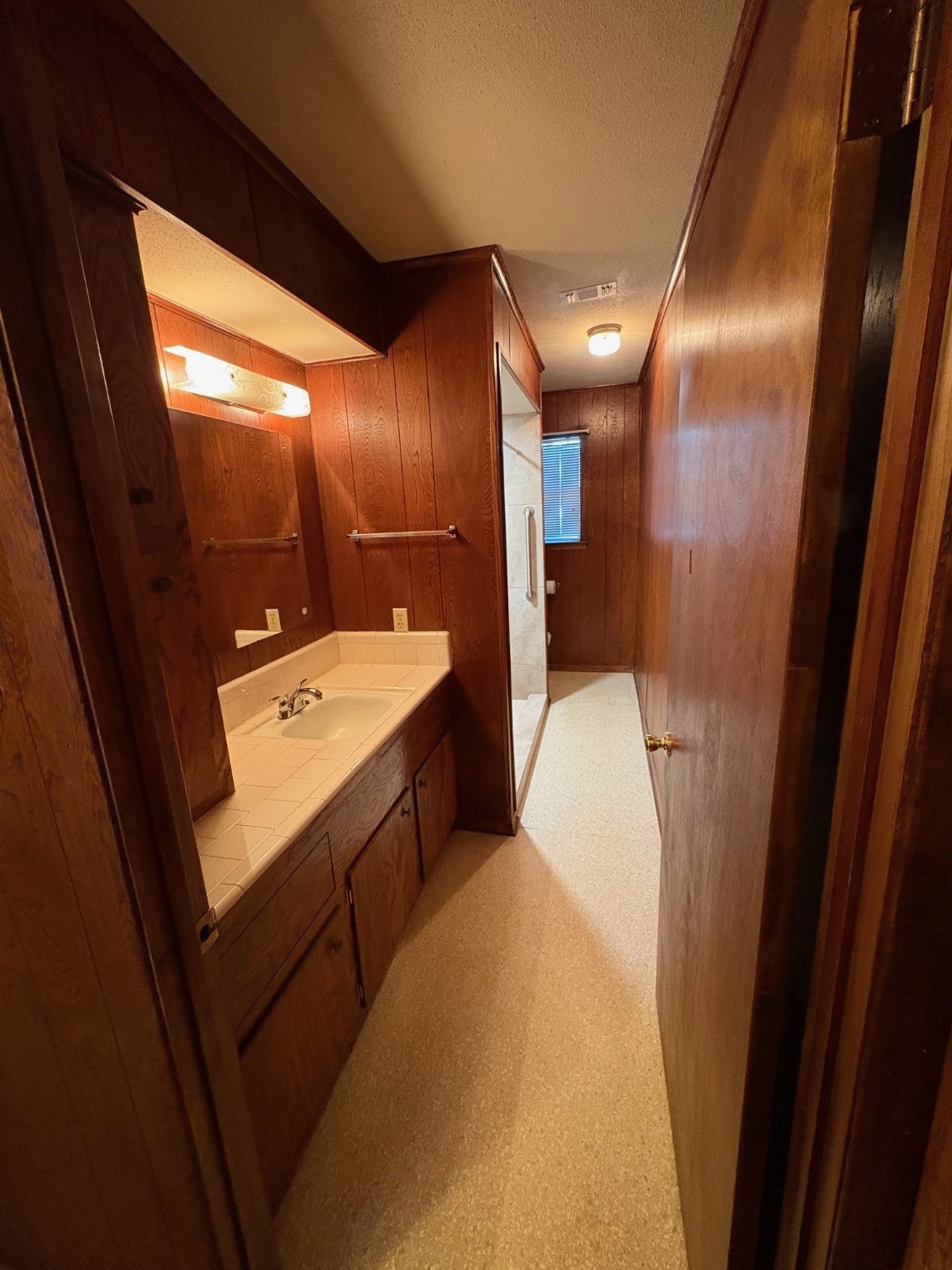 2126 Ripple Creek Drive Rosenberg, TX 77471 - Photo 15 of 21 a bathroom with a sink and mirror