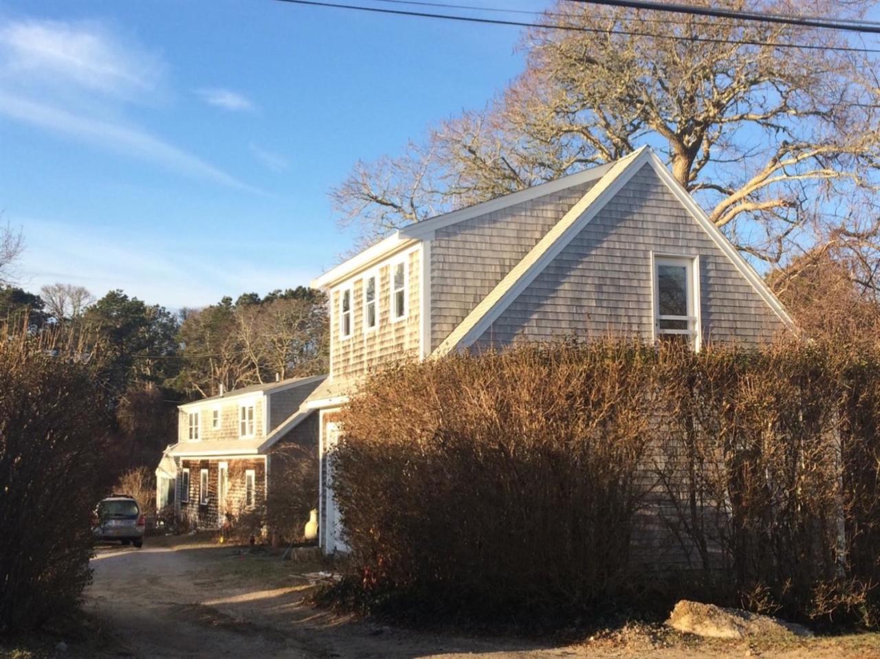 889 Orleans Road North Chatham, MA 02650 - Photo 1 of 10 a view of a house with a yard
