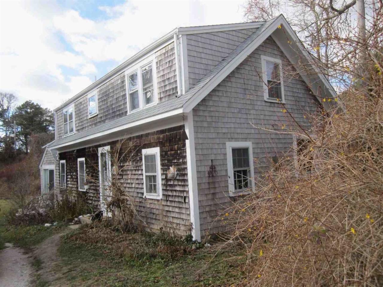 889 Orleans Road North Chatham, MA 02650 - Photo 6 of 10 a front view of a house with garden