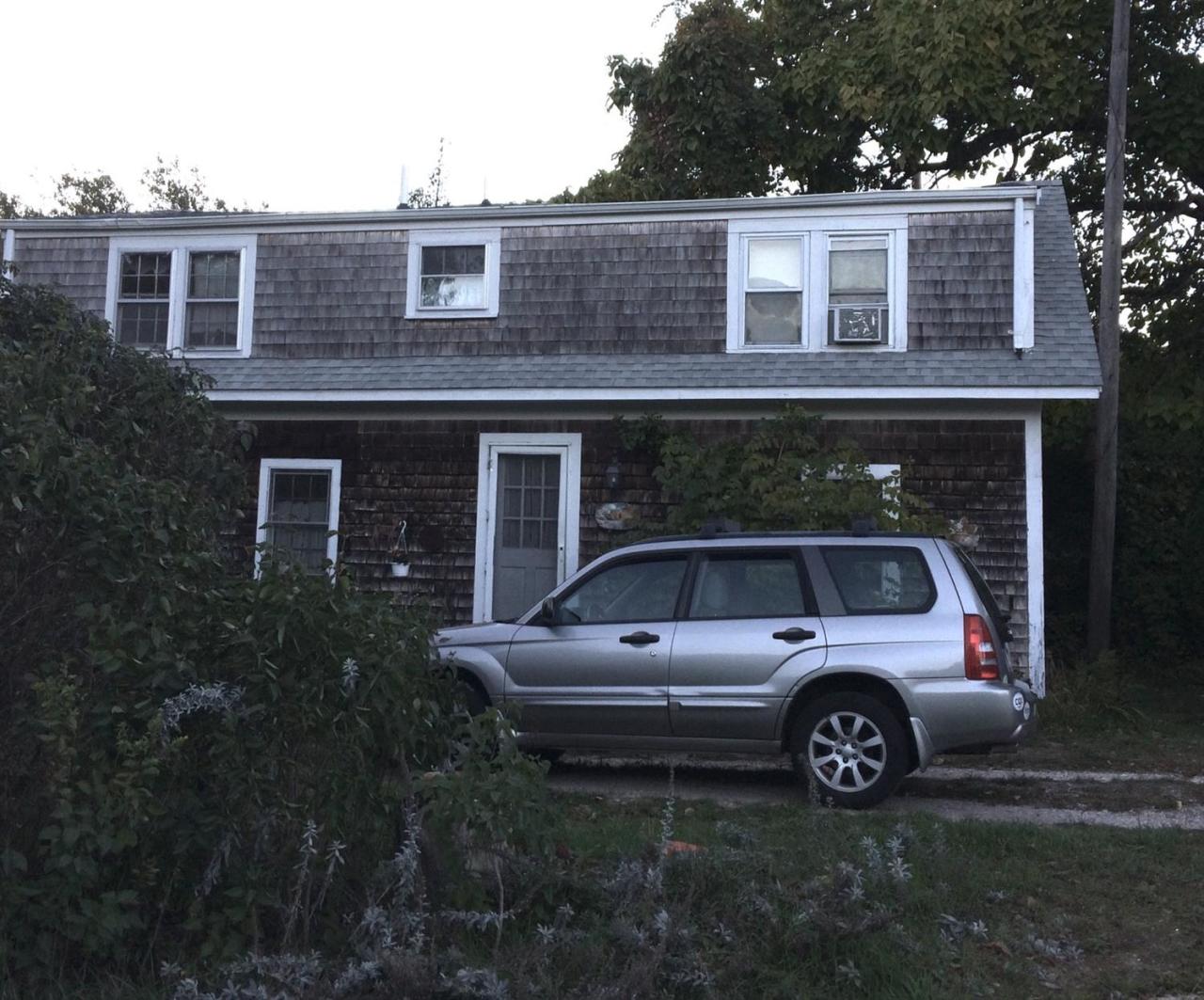 889 Orleans Road North Chatham, MA 02650 - Photo 9 of 10 a car parked in front of a house