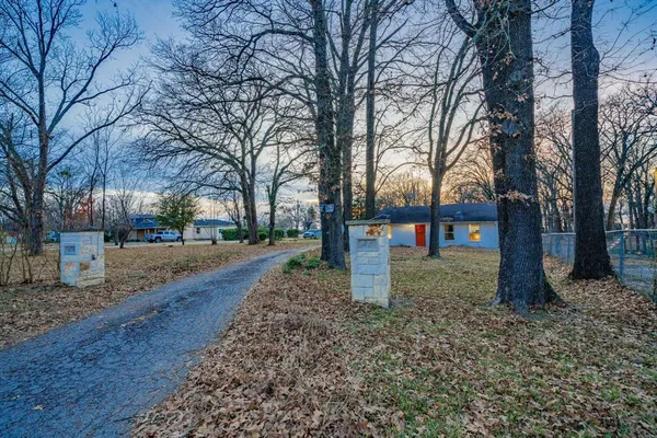 a outdoor space with lots of trees