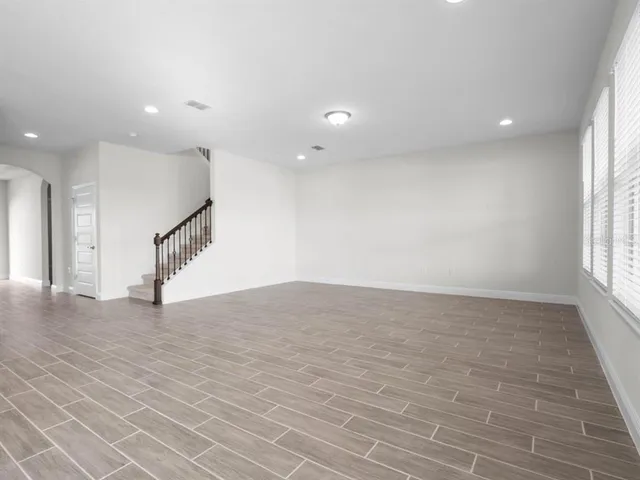 a kitchen with a stove a sink and a refrigerator