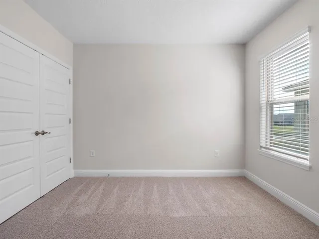 a view of a garden with an outdoor space