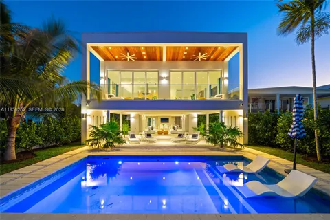 a view of swimming pool with a patio