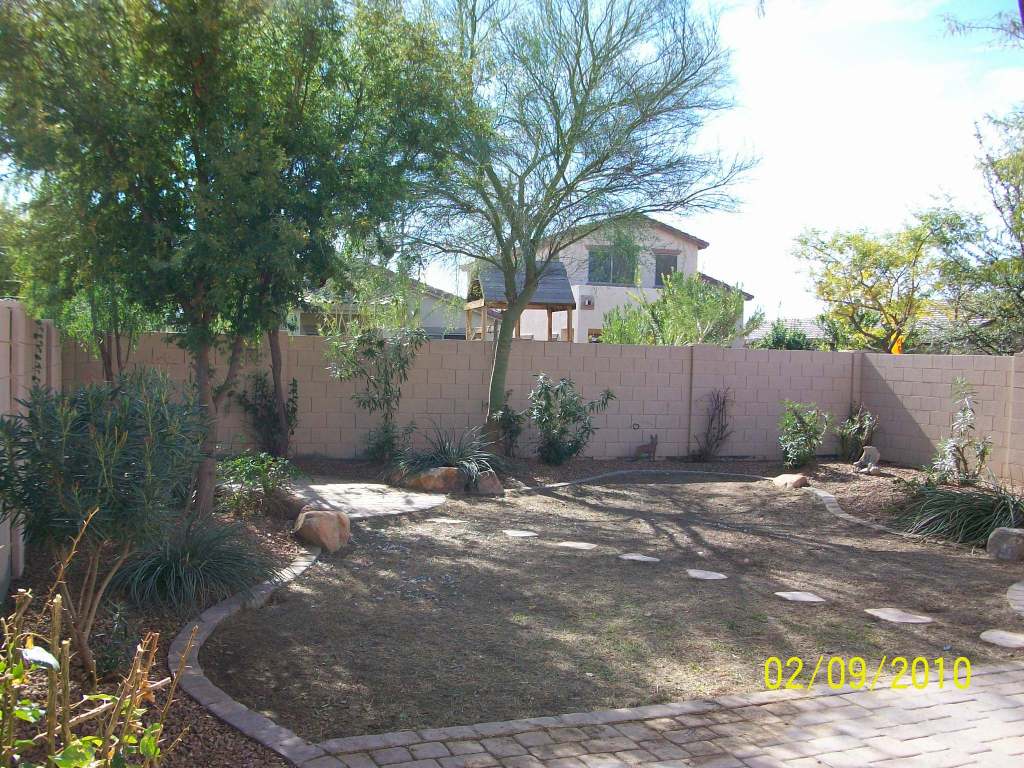 4312 South Rim Court Gilbert, AZ 85297 - Photo 2 of 20 Beautifully landscaped backyard