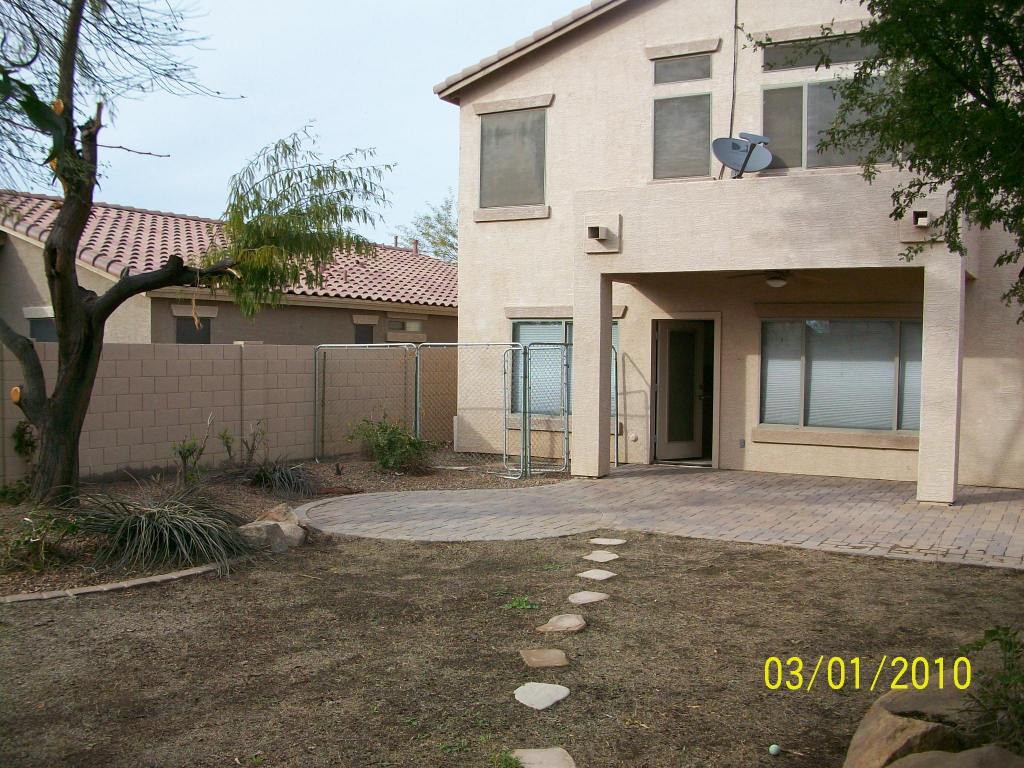 4312 South Rim Court Gilbert, AZ 85297 - Photo 4 of 20 Covered patio with ceiling fan