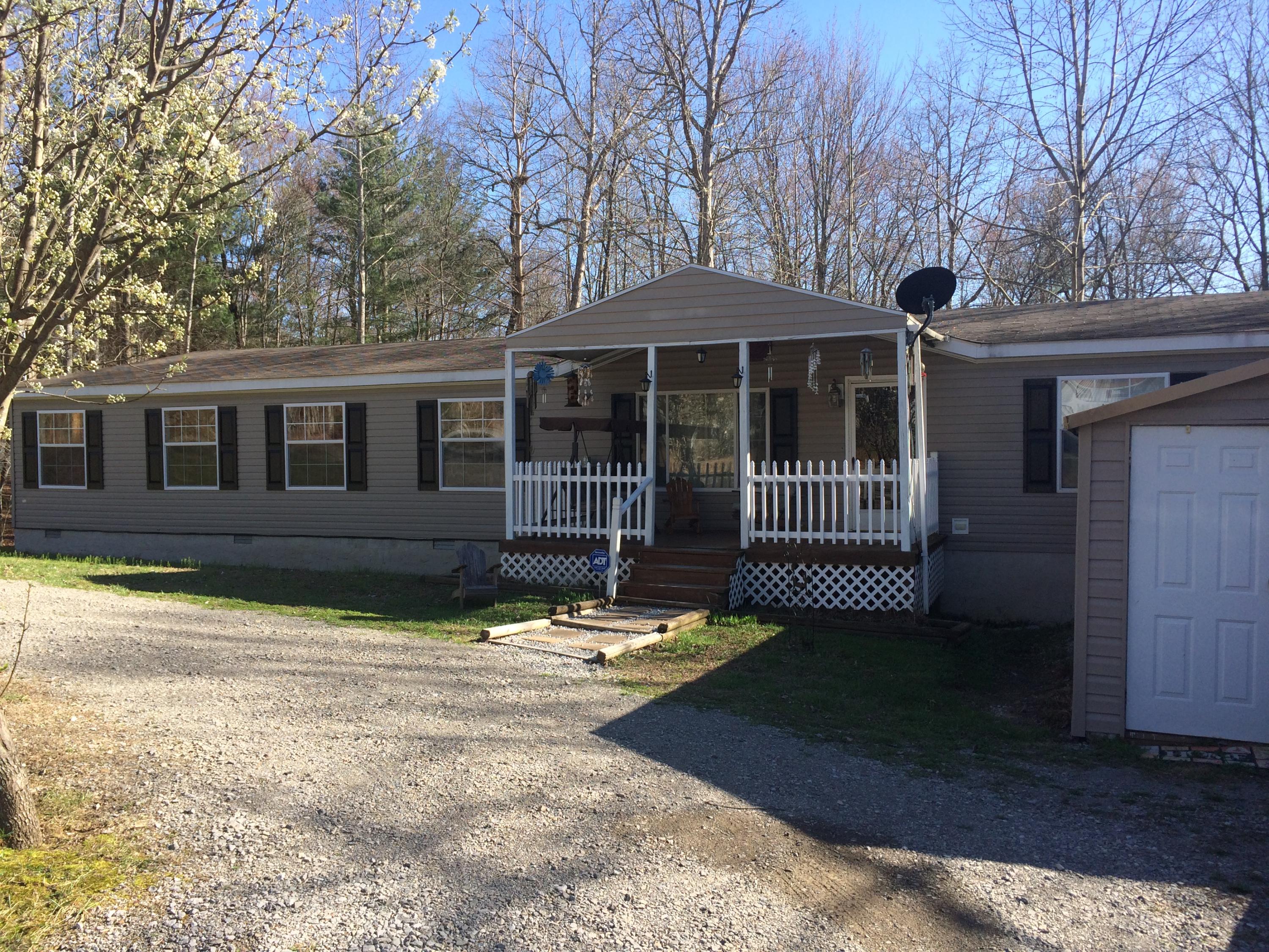 135 Raccoon Creek Road Crossville, TN 38572 - Photo 2 of 34 Front of 135 Raccoon Creek Road