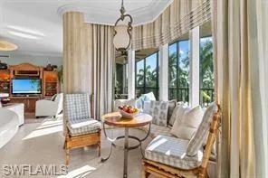 a outdoor living space with furniture and a potted plant