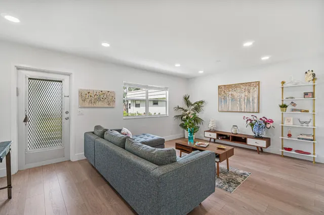 a living room with furniture and window