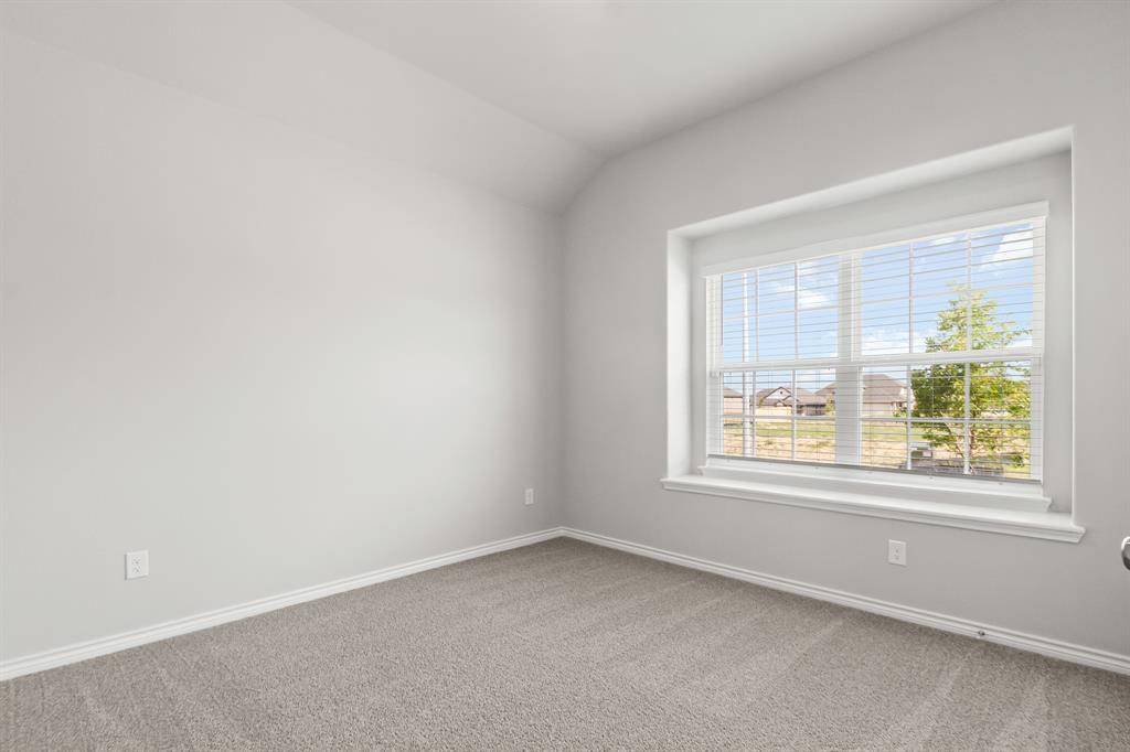 6909 Cattle Car Way Crowley, TX 76036 - Photo 14 of 24 an empty room with a window