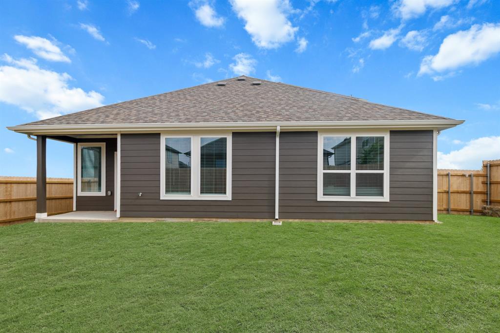 6909 Cattle Car Way Crowley, TX 76036 - Photo 18 of 24 a brick house with a large windows