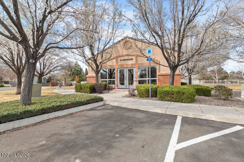 403 Sierra Leaf Circle Reno, NV 89511 - Photo 23 of 25 a view of a white house with a large tree