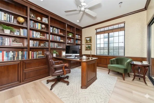 a living room with a fireplace and a window