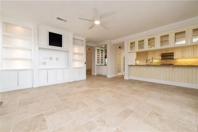 a spacious bathroom with a double vanity sink mirror and double