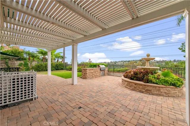 a view of a yard with an outdoor seating