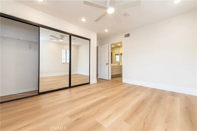 a bathroom with a toilet and a bathtub