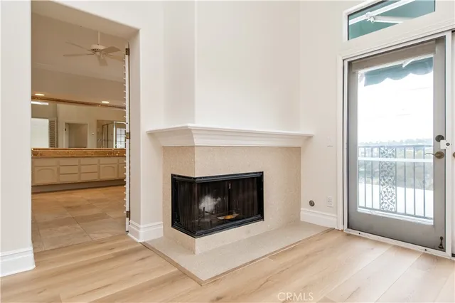 a spacious bathroom with a granite countertop tub sink and mirror