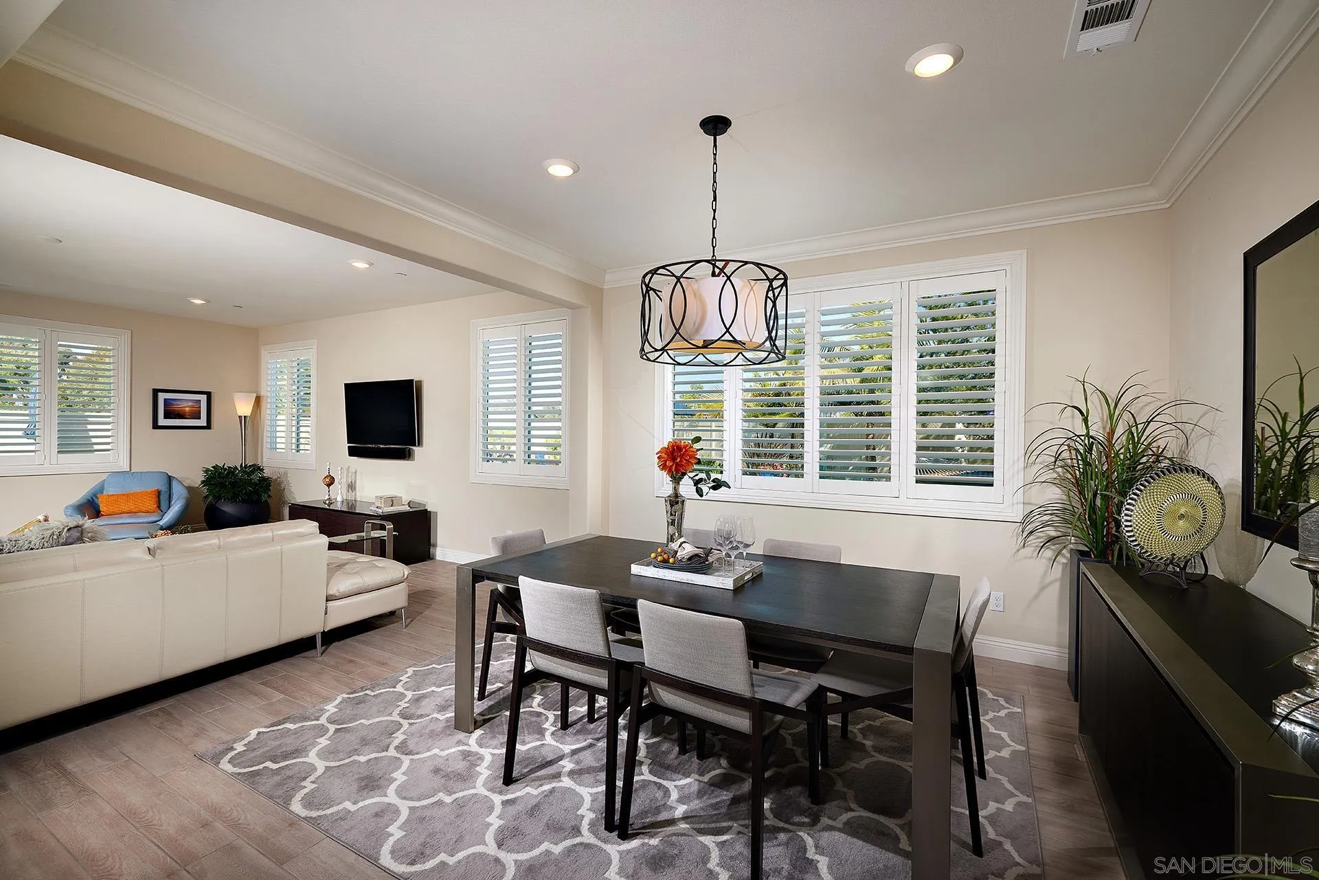 1179 Tesoro Place Vista, CA 92081 - Photo 12 of 49 a living room with furniture and a flat screen tv
