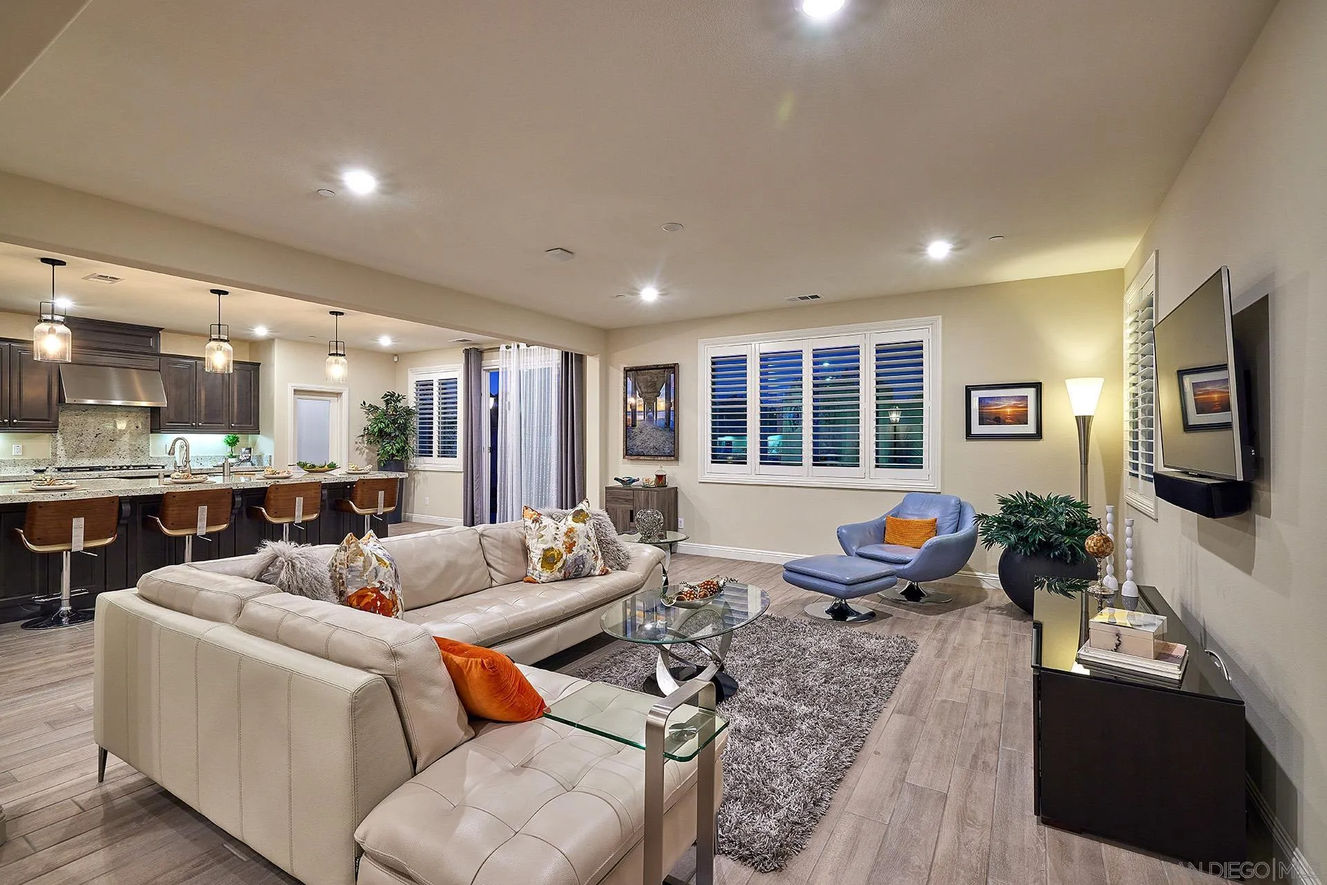 1179 Tesoro Place Vista, CA 92081 - Photo 14 of 49 a living room with furniture kitchen view and a large window