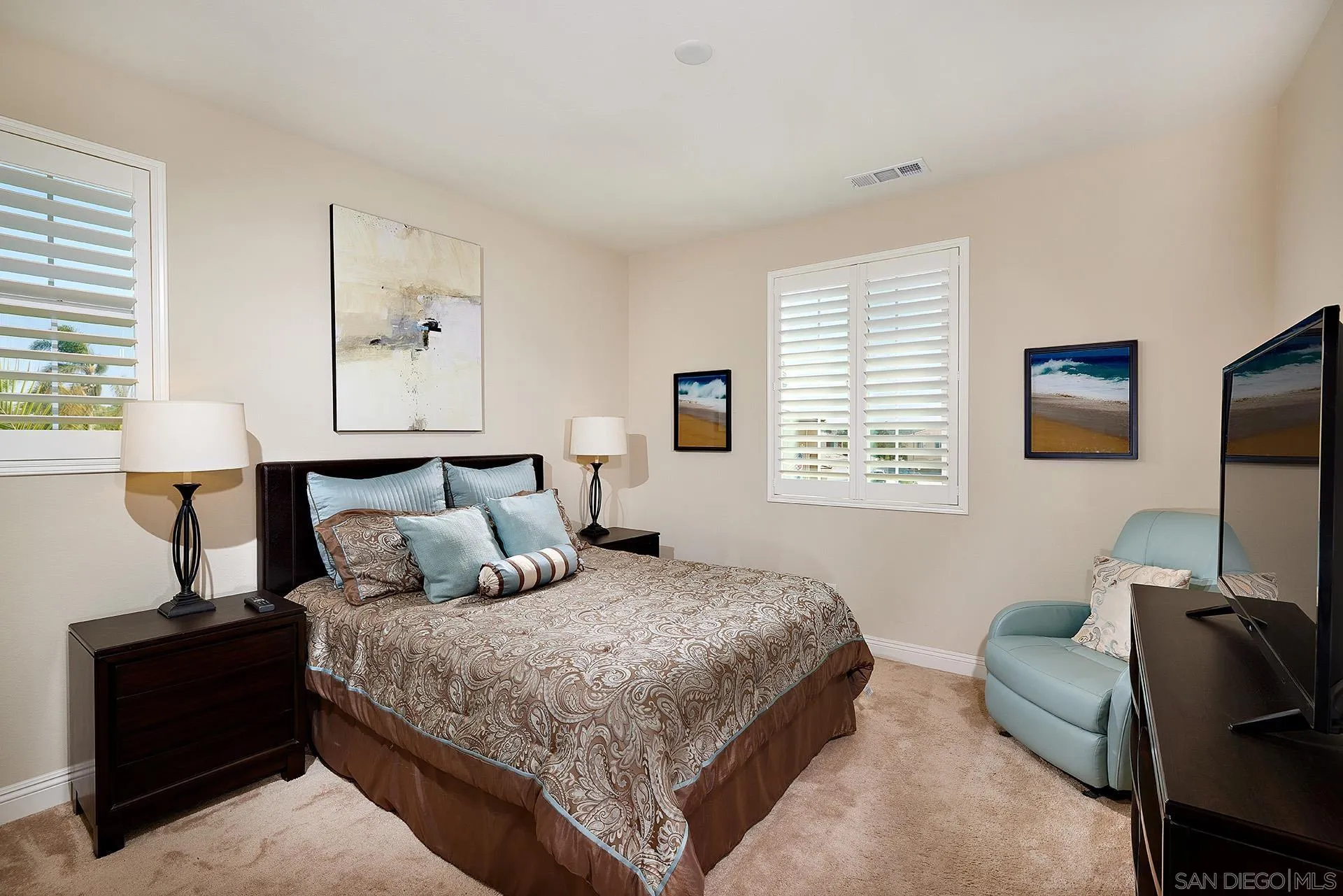 1179 Tesoro Place Vista, CA 92081 - Photo 18 of 49 a bedroom with a bed and a window