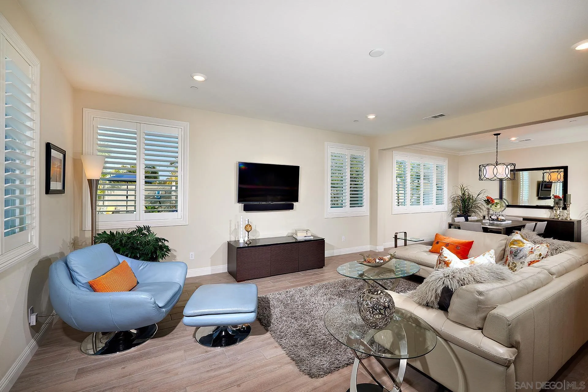 1179 Tesoro Place Vista, CA 92081 - Photo 25 of 49 a living room with furniture and a flat screen tv