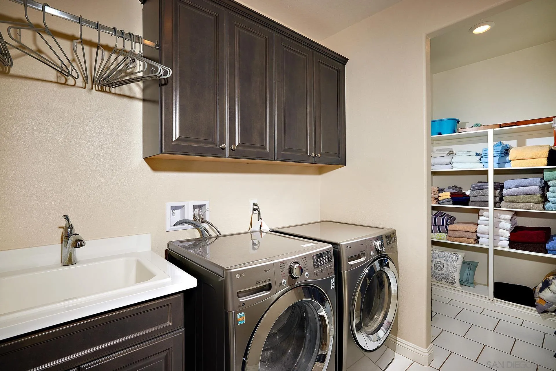 1179 Tesoro Place Vista, CA 92081 - Photo 29 of 49 a utility room with dryer and washer