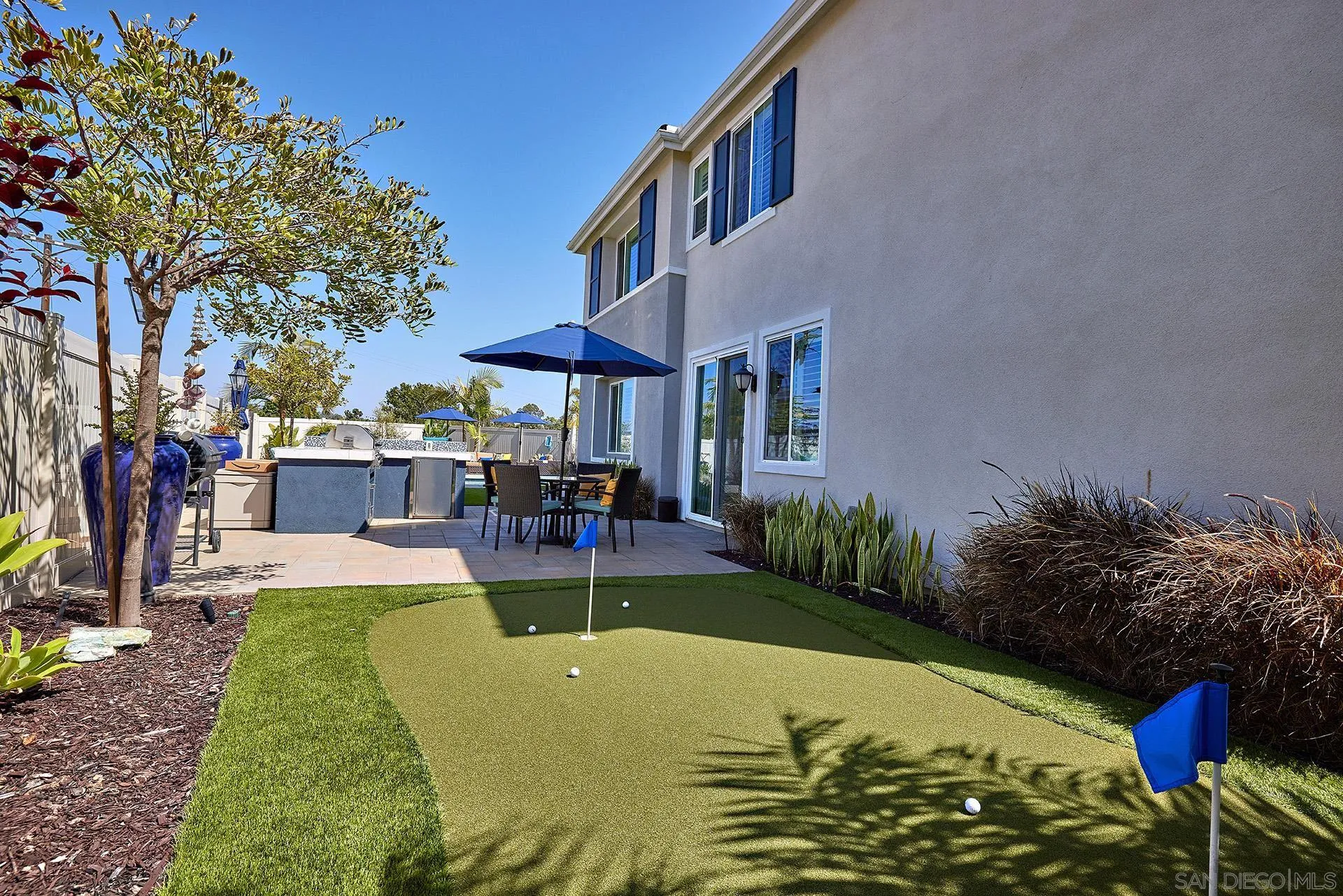 1179 Tesoro Place Vista, CA 92081 - Photo 38 of 49 a view of a house with swimming pool and sitting area
