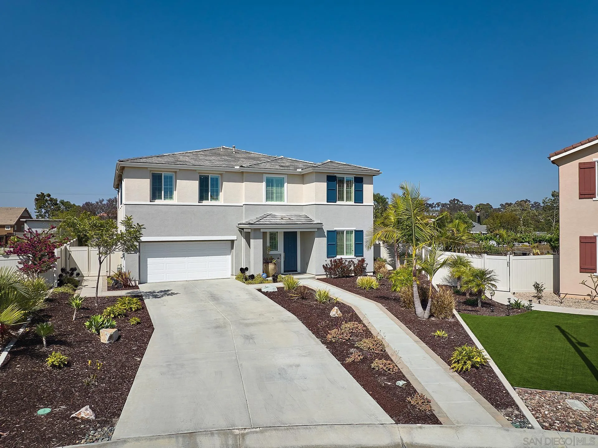 1179 Tesoro Place Vista, CA 92081 - Photo 45 of 49 a front view of a house with a yard