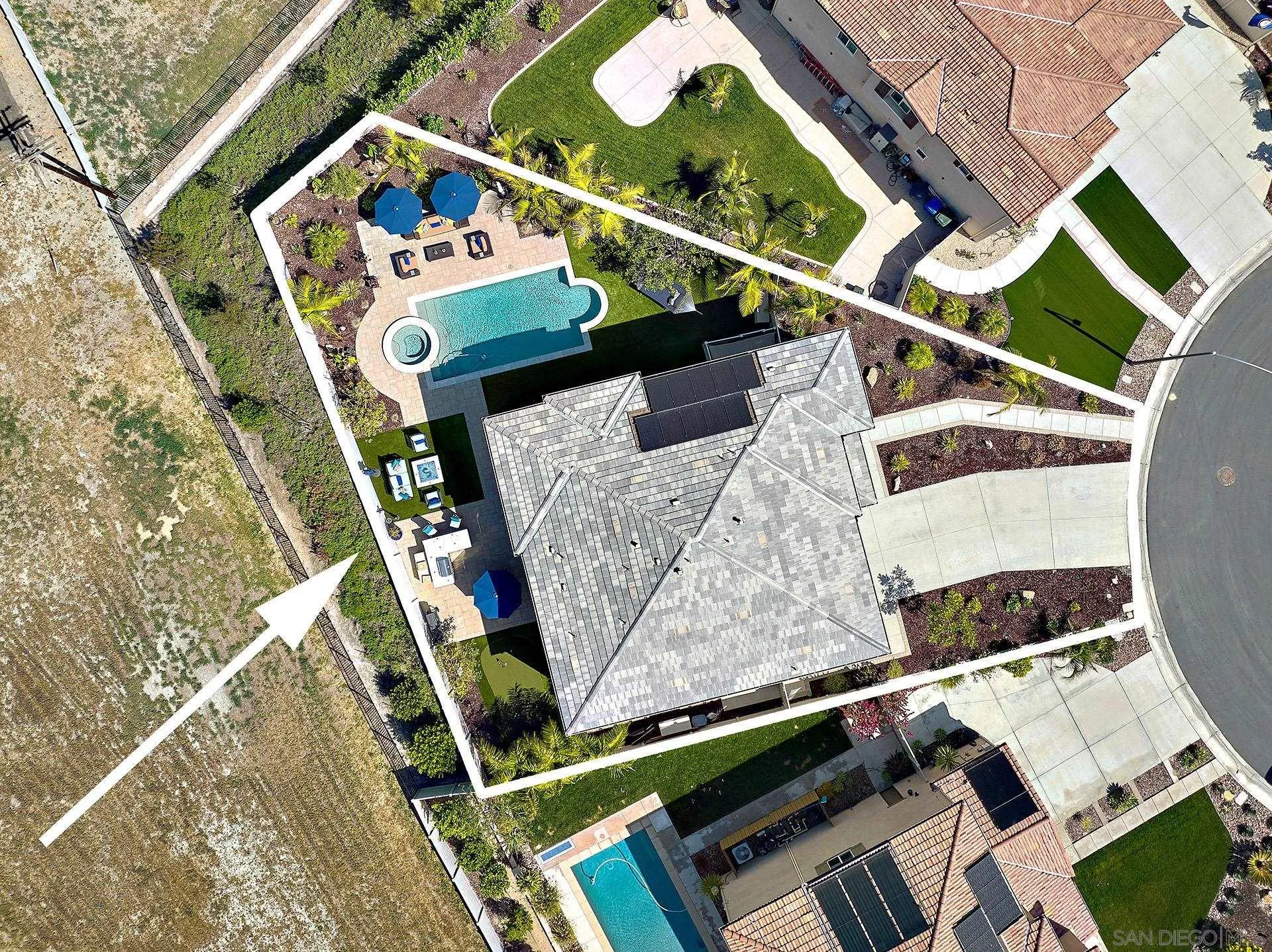 1179 Tesoro Place Vista, CA 92081 - Photo 48 of 49 aerial view of an chairs and hall with wooden floor