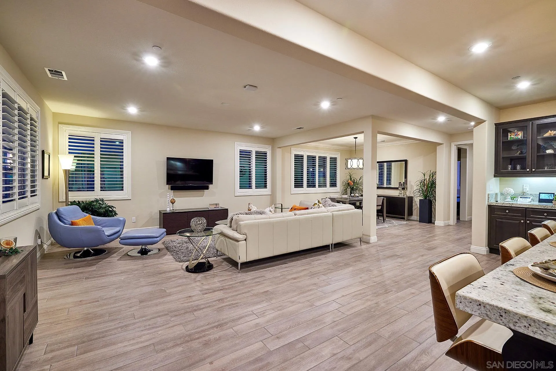 1179 Tesoro Place Vista, CA 92081 - Photo 5 of 49 a living room with furniture wooden floor and a flat screen tv