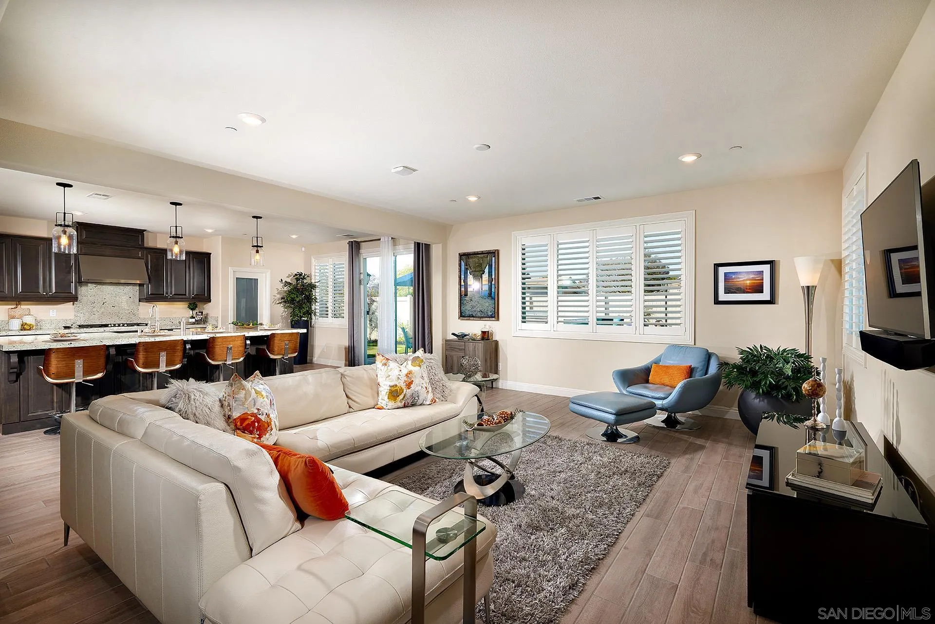 1179 Tesoro Place Vista, CA 92081 - Photo 9 of 49 a living room with furniture kitchen view and a large window