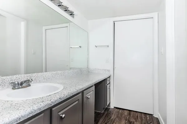 a bathroom with a bathtub and toilet
